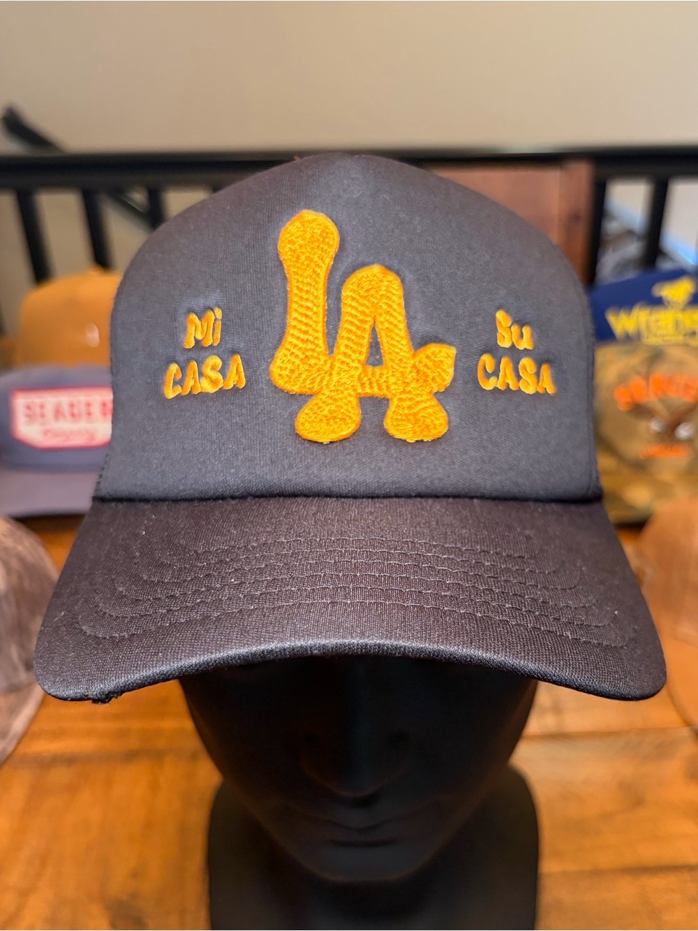 Good Quality Human Mi Casa Su Casa Black Trucker Hat with Gold LA Logo